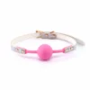 Cosmo Bondage Ball Gag holograficzny, regulowany, winylowy, Rose Gold